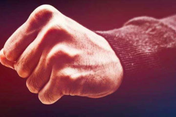 Managing Conflict. picture of person's fist.